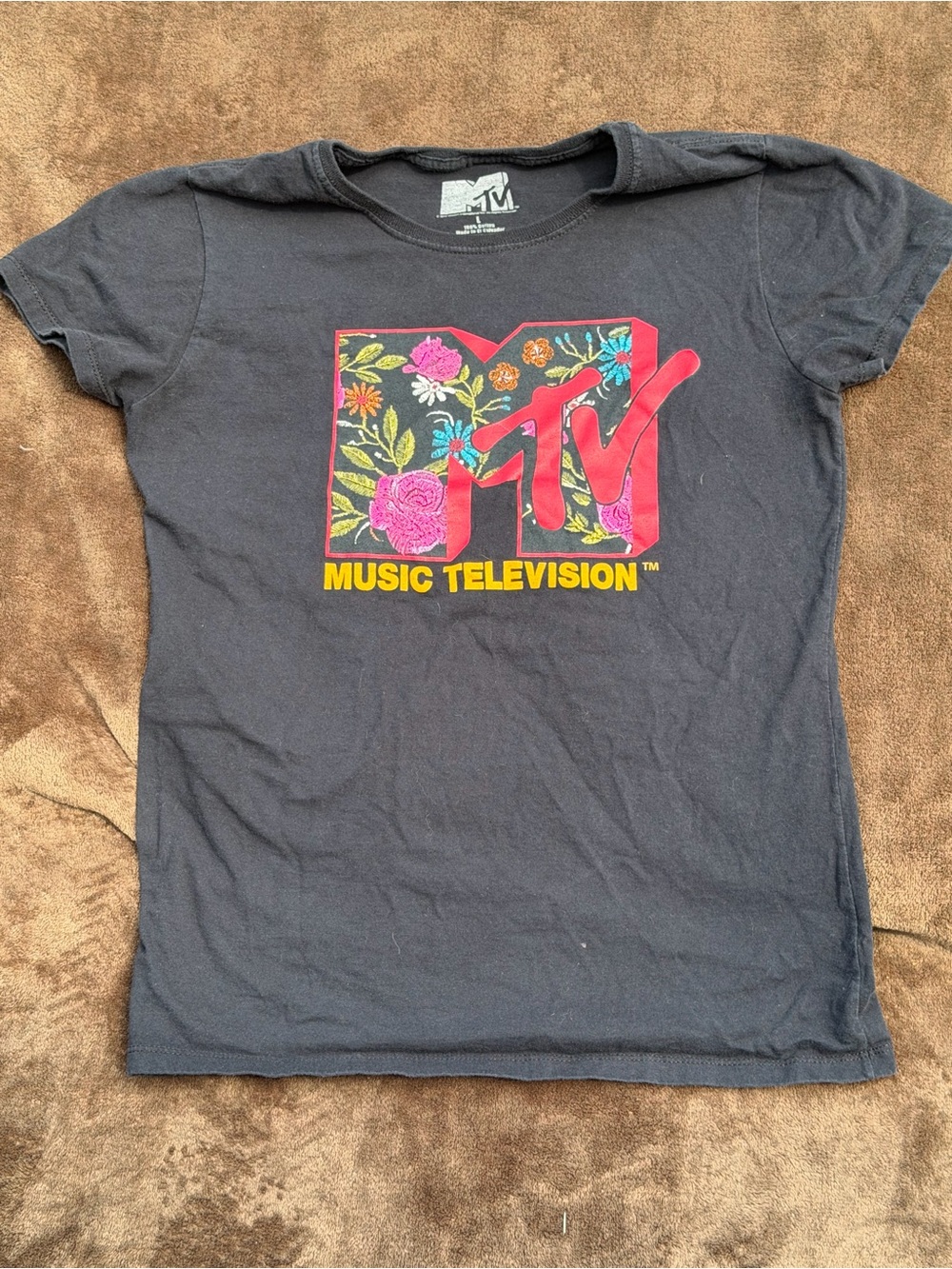 MTV Black Tee with Pink Floral Logo and Yellow Text